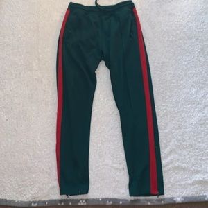 Green an red track pants